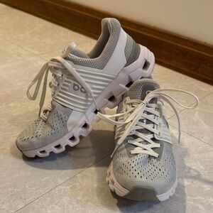 Gray and White On Cloud womens size 5 sneakers.